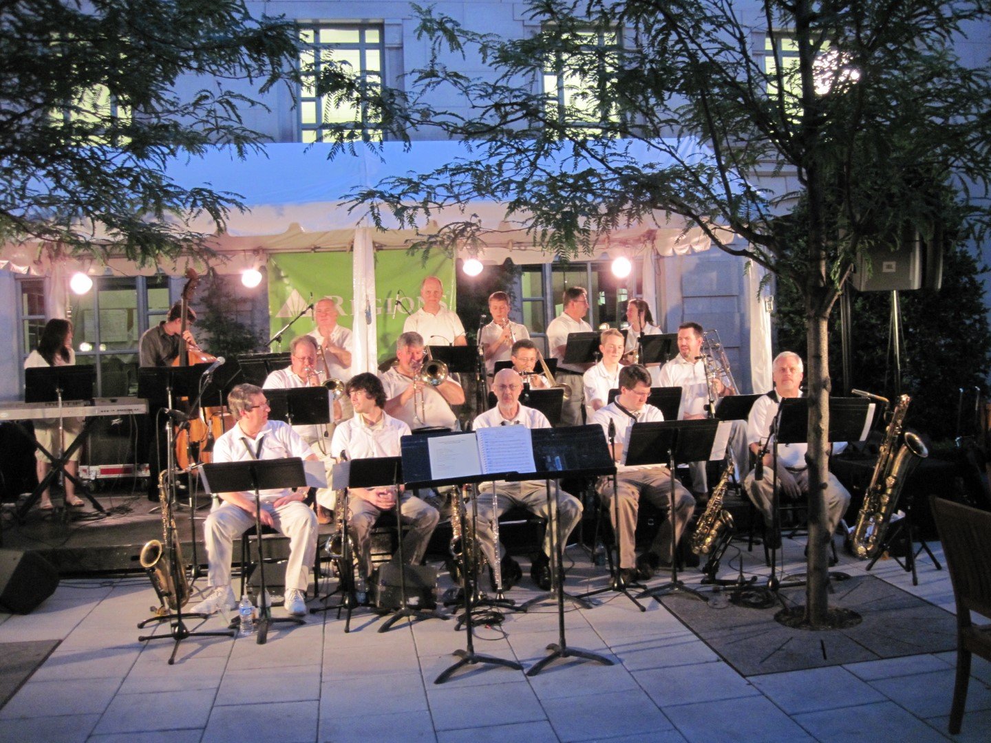 The Establishment performing at an outdoor community event