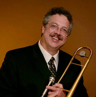 Bill Huber holding a trombone